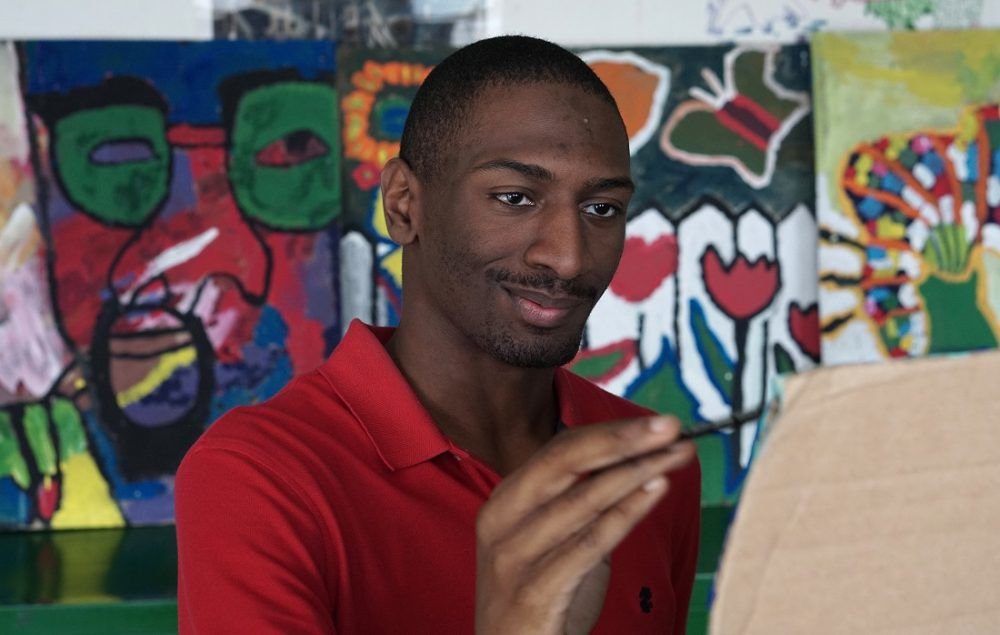 Naieer, an autistic high school student from Massachusetts, expresses himself through beautiful artwork in Dan Habib's documentary “Intelligent Lives.” Courtesy photo