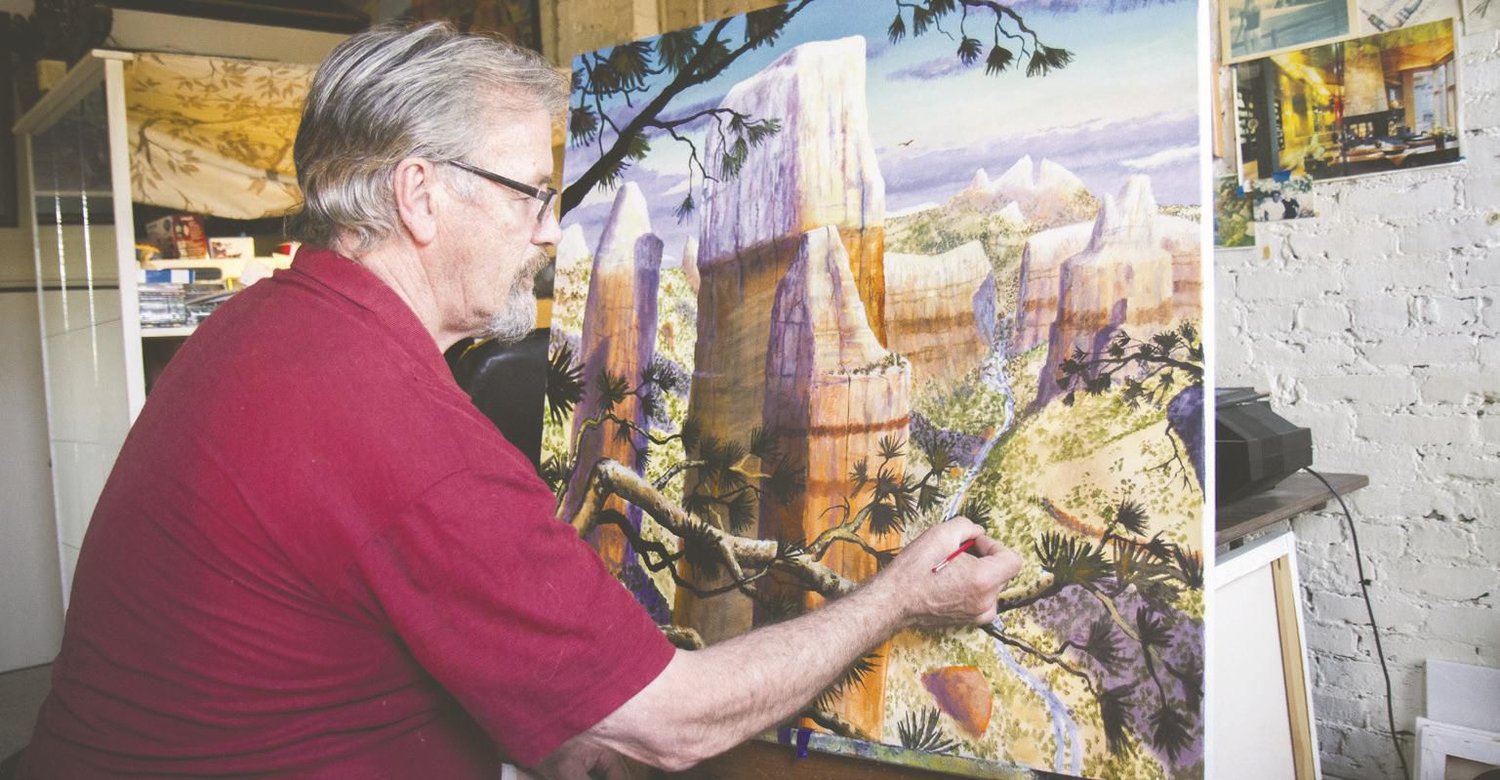 Michael Hale paints southwestern wilderness at his Port Townsend home studio.