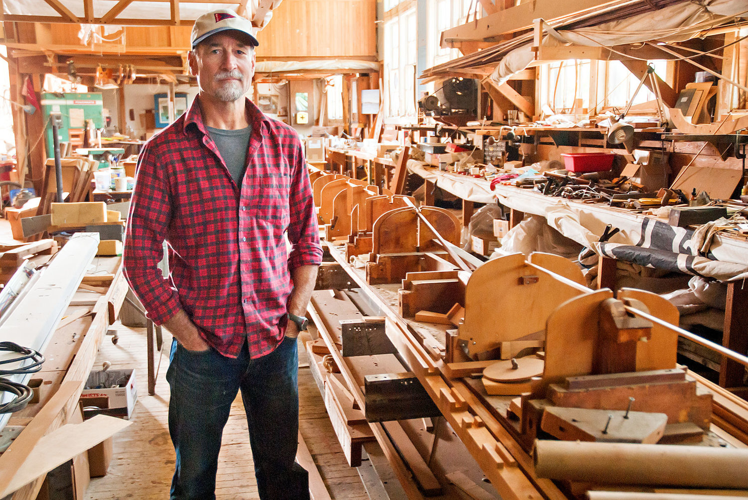 Boat making tools surround Steve Chapin as he stands inside his Point Hudson boat shop Aug. 14. Photo by Chris Tucker