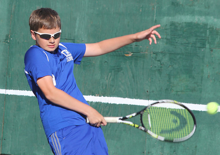 Chimacum sophomore Zach Engle warms up for a tennis match. Photo by Patrick Sullivan