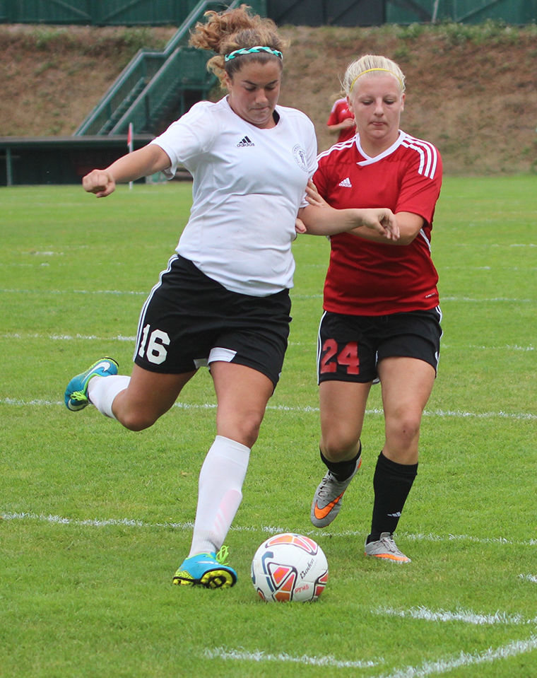 Port Townsend sophomore Breanna Franklin (left) goes for the ball Sept. 17 in a 3-0 league loss to Coupeville. Photo by Stephanie Davey