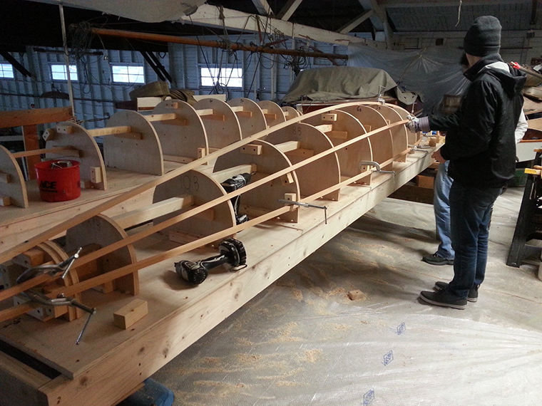 The University of Washington submarine team delivered two halves of a plywood frame to the Northwest School of Wooden Boatbuilding, whose students molded a cedar hull around the frame. The UW team used a wooden sub in 1989, but no schools have entered a wooden sub in collegiate competitions in more than 10 years. Courtesy photo