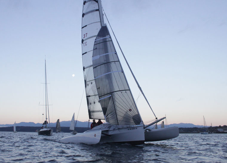 The trimaran of Team Elsie Piddock was one of the last boats across the inaugural Race to Alaska starting line in Port Townsend (pictured) on June 4, 2015, and arrived in Victoria, British Columbia, in four hours and 11 minutes (third place). It went on to finish first from Victoria to Ketchikan, in four days, 23 hours and 55 minutes. "Team Elsie Piddock has amazed people all over the world, started countless conversations that either started or ended with 'Can you (choose your expletive) believe them?" said Jake Beattie, Northwest Maritime Center executive director and one of the brains behind R2AK. Photo by Robin Dudley