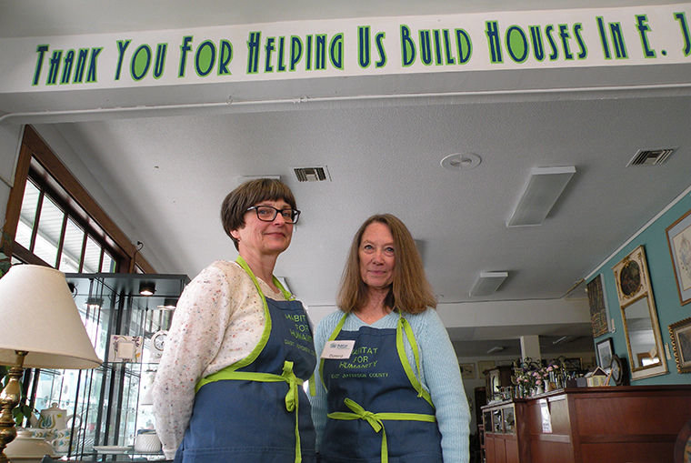 Lou Boyle and Danna Owens volunteer to sell household items for Habitat of Humanity of East Jefferson County in Port Townsend, with sales of such items benefiting the program. Manager Vicki Lucas said that in 2013, the last year for which she has statistics, Habitat saved 31,209 pounds of items from going into the landfill. What Habitat doesn't sell, it leaves out in a shed for people to pick up for free. Last year, Habitat had a dumping bill of only $62, thanks to that shed. Photo by Allison Arthur