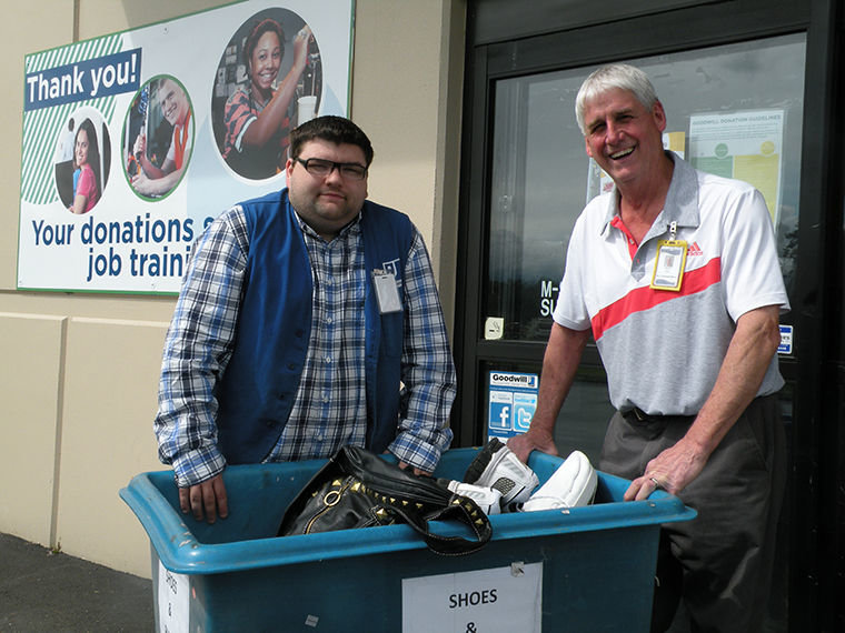 Kevin Roberts of Chimacum is hoping to land a job at Goodwill in Port Hadlock and is volunteering first to learn the ropes. Manager Dave Shaub says the Port Townsend shop has a staff of 19 people, six of whom have come through a community jobs program. Photo by Allison Arthur
