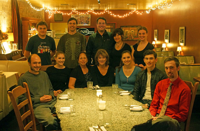 Lanza's Ristorante owners Steve and Lori Kraght (center back) are surrounded by employees, including (from left) Gannon Short, Seth Nelson and Danielle Lund in back, and Jimmy Pavlicek, Jaclynne Harrell, Norma Bridges, Julie Lanza, Rebecca Spencer, Milo Steimle and Cameron Meiner. Not pictured are Linda May and Brooklyn Johnson. Photo by Nicholas Johnson