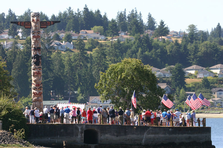 The totem pole erected on Burner Point in Port Ludlow in 1995, and refurbished in 2015, was rededicated in a July 4 ceremony that blended a celebration of America's Independence Day with special recognition of Native American art and culture. Photos by Jonathan Glover
