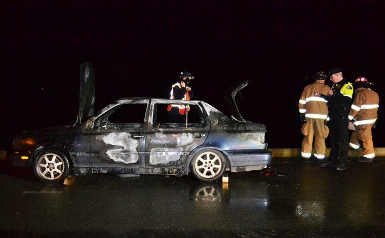 An investigation is under way on the origin of a fire that started in the rear seat of this Volkswagen Jetta, as reported at about 3:18 a.m., Feb. 22. A man in the car suffered burns to his hands while trying to extinguish the blaze. Photo by Bill Beezley, East Jefferson Fire Rescue