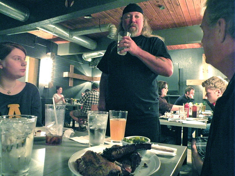 Bret "Zoog" Forsberg chats with restaurant customers (include Port Townsend's Alexus Fasenmyer) Nov. 18, 2014 on the "reveal" night following two intense days of work and filming for the Food Network show "Restaurant Impossible." The episode is set to air Feb. 4, 2015; until then, Zoog is limited in what he can say in public about the experience. Photo by Allison Arthur