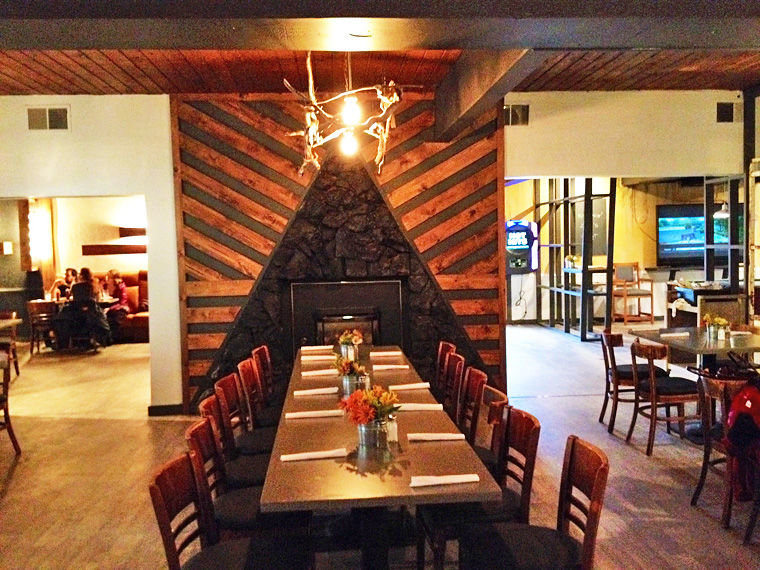 The fireplace original to the restaurant is a refreshed focal point after the "Restaurant Impossible" makeover. Photo by Jen Clark
