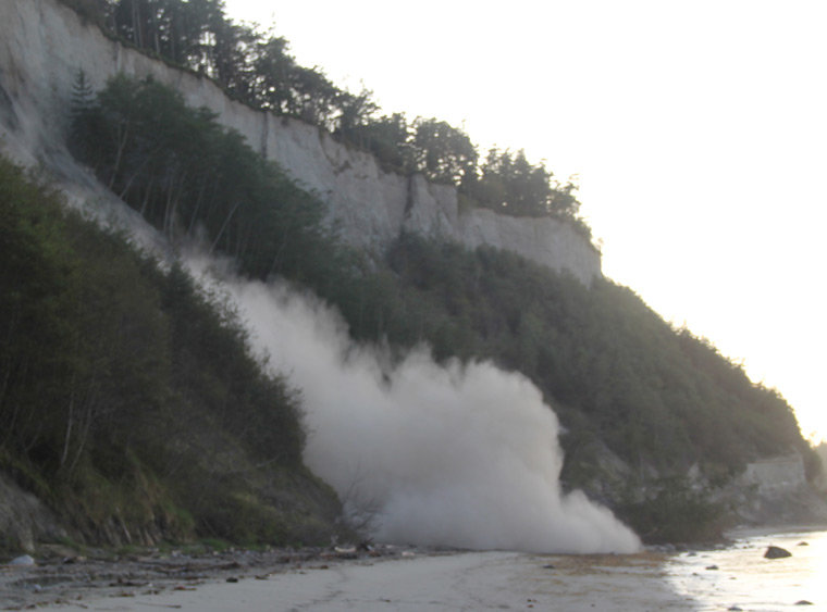 On Sunday, Oct. 13, 2013 another large chunk of sand and debris tumbled to the beach below “End of the World,” a bluff overlooking the Strait of Juan de Fuca on the edge of Port Townsend. Photo by Scott Wilson