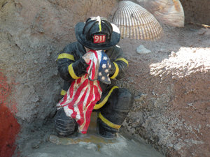 A sculpture of a fallen firefighter is on the “spiritual” side of the earthbench. Al Nejmeh, who lived on Marrowstone Island, was a Tacoma firefighter. He died May 14, 2013 of an apparent heart attack while giving CPR to a patient. He was 59.