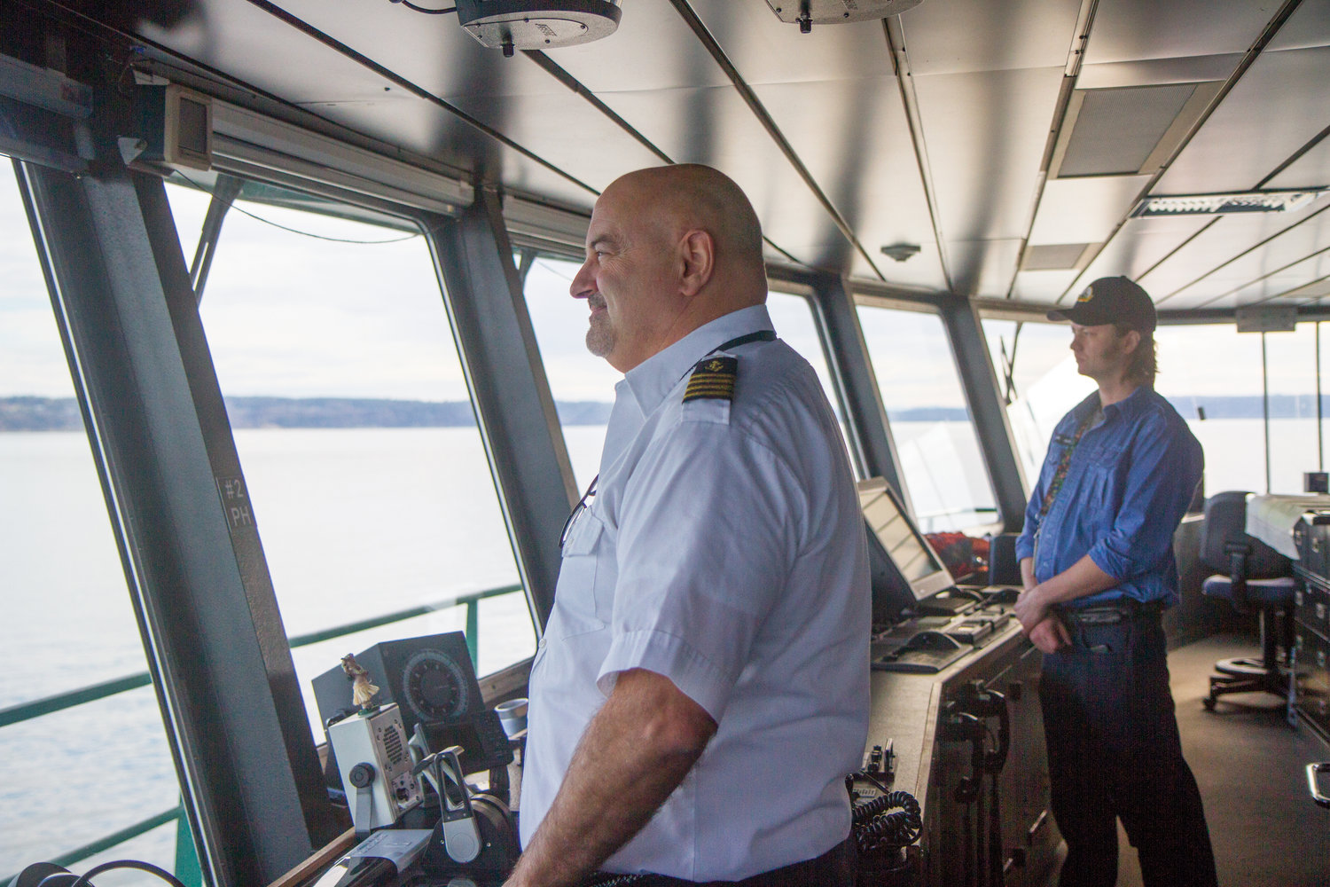Capt. Dennis Hausdorf looks out on the Salish Sea while taking the ferry from Port Townsend to Coupeville.