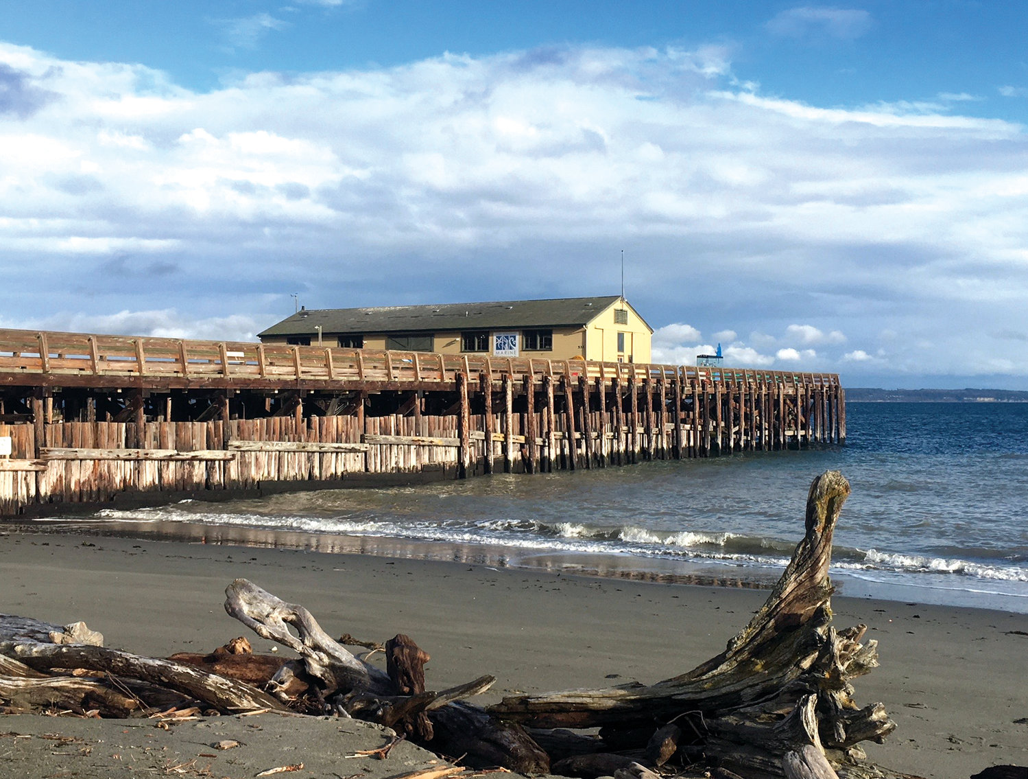 The Port Townsend Marine Science Center aquarium stands at the end of the pier at the beach at Fort Worden. This pier is secure, but needs to be repaired or replaced in the coming years, said Janine Boire, executive director of the science center.