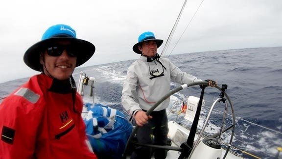 Matt Pistay, right, of Port Ludlow on deck during Team Hamachi's bid to win the 2019 Transpacific Yacht Race.