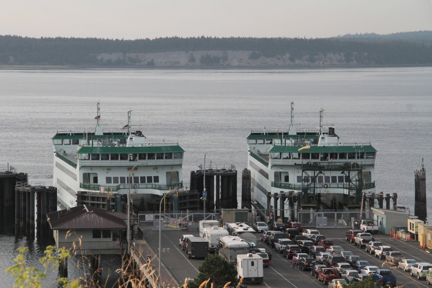 Two ferries are docked at the Port Townsend Ferry Terminal.