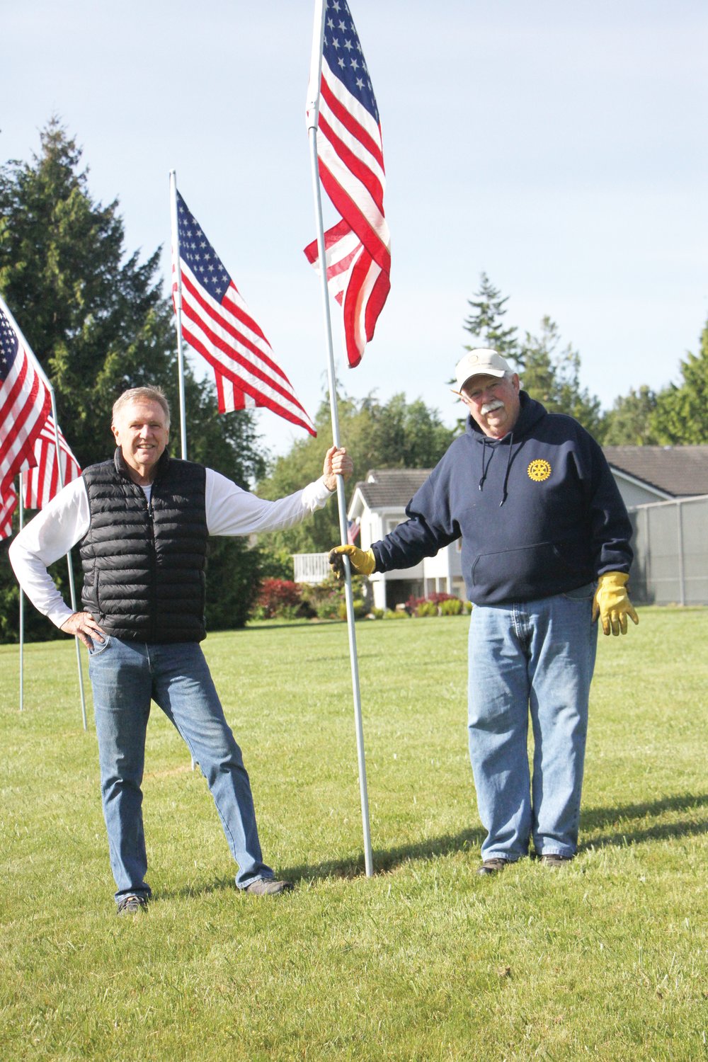 Howard Strong (left) and Ned Luce of East Jefferson Rotary Club pose after their hard work on Saturday.