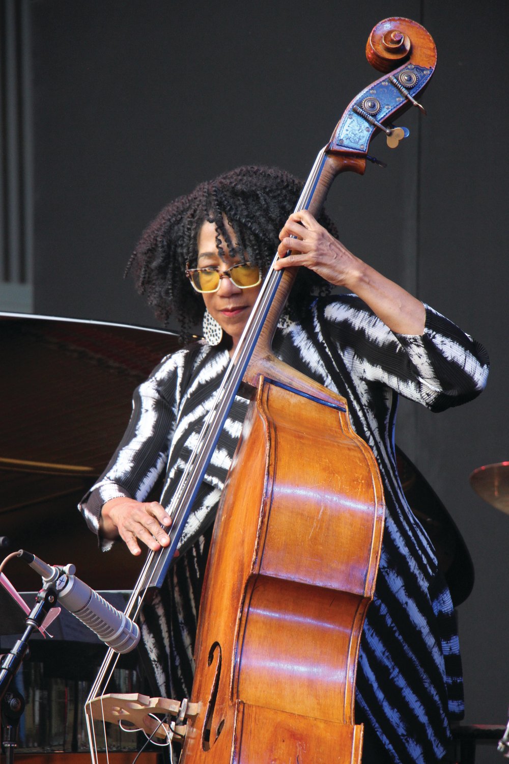 Musician Marion Hayden plays out the beat of a song on the upright bass.