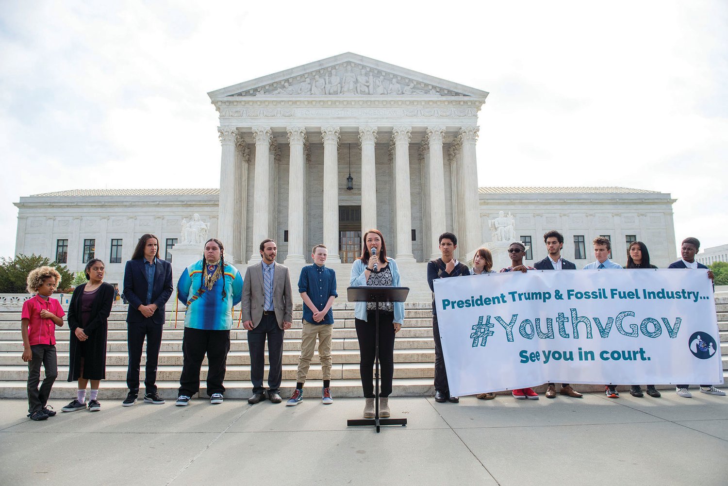 Kelsey Juliana, the oldest of the 21 young plaintiffs, delivers a speech in front of the U.S. Supreme Court building. Experiencing disasters from hurricanes to droughts in each of their communities, the kids and young adults involved in the case joined together to sue the U.S. Government for failing to mitigate climate change, impacting their rights as American citizens.