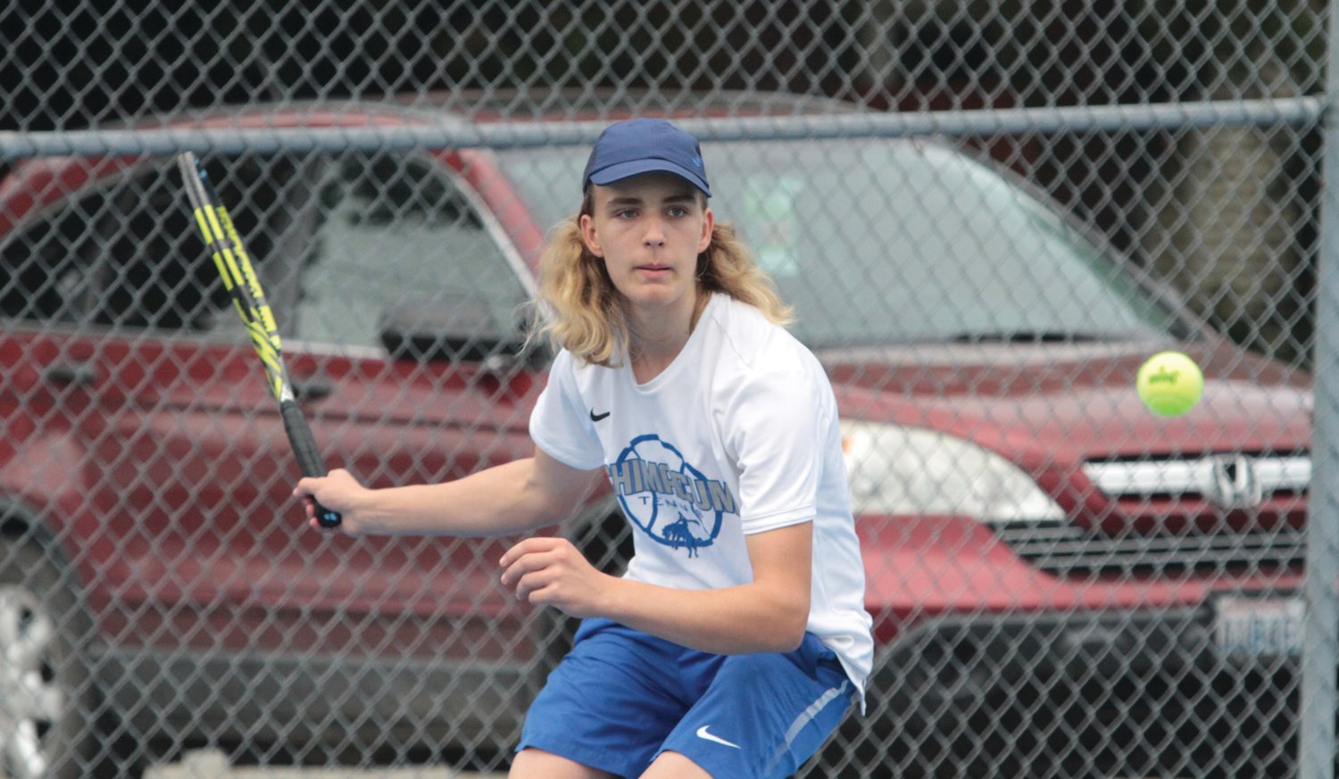 Reid Martin keeps his eyes on the ball during No. 1 singles at the recent matchup against Annie Wright School’s Owen Hayes in boys varsity tennis.