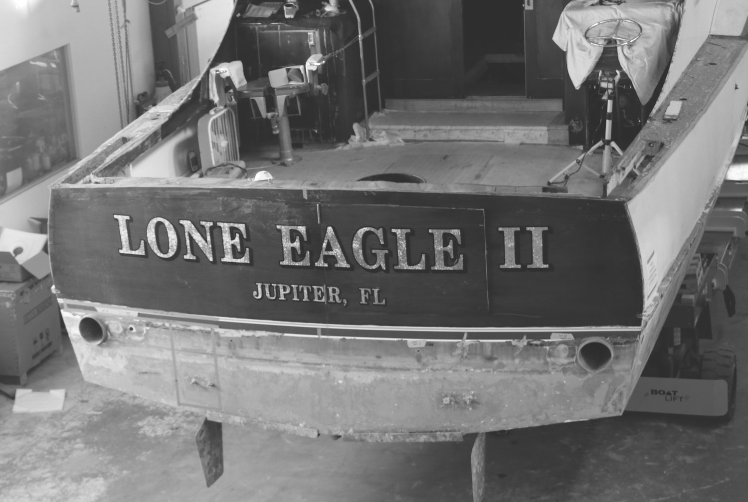 The stern of Lone Eagle II under renovations in SEA Marine Navy building.