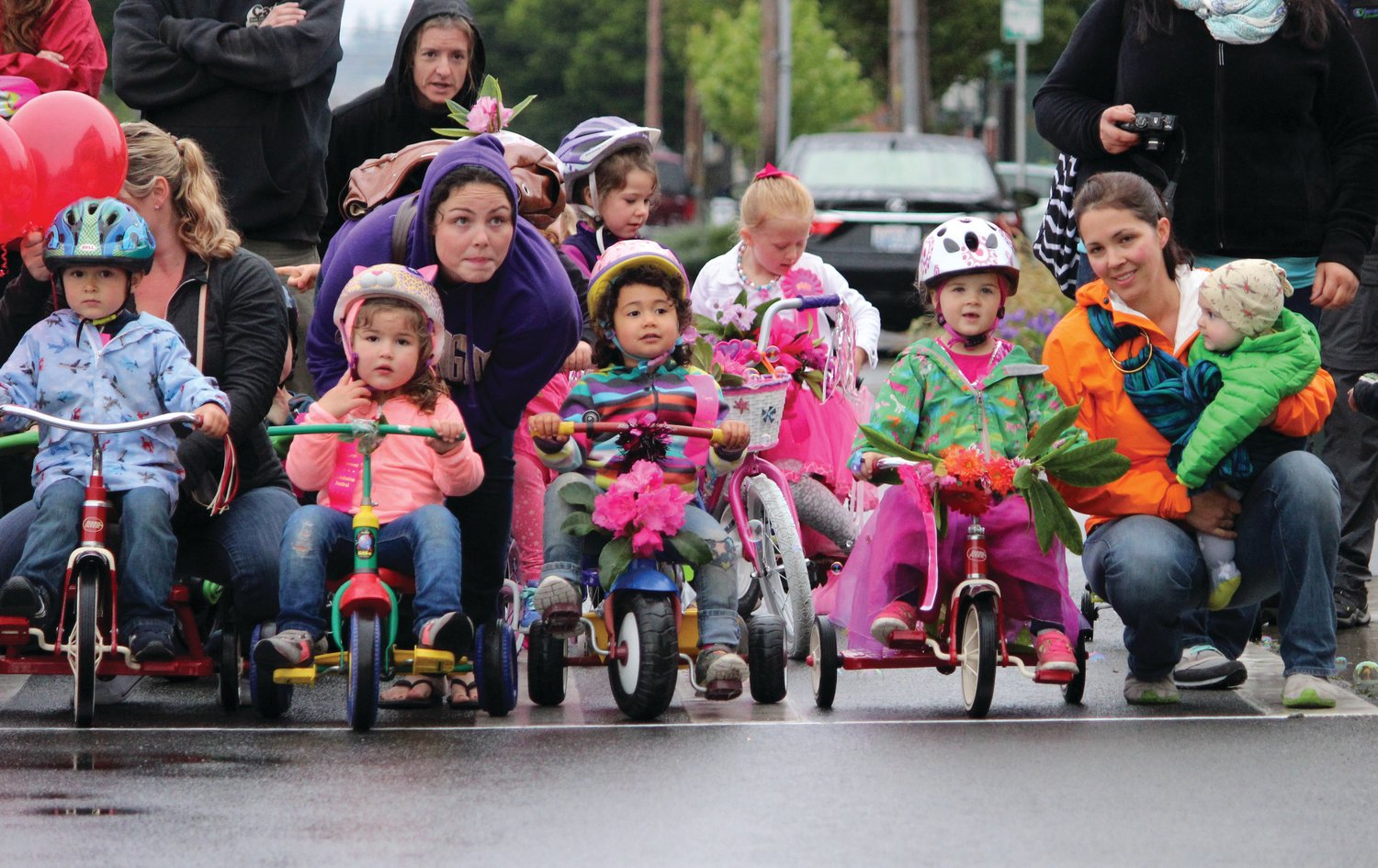 Kids line up for the Trike Race during an earlier Rhody Festival.