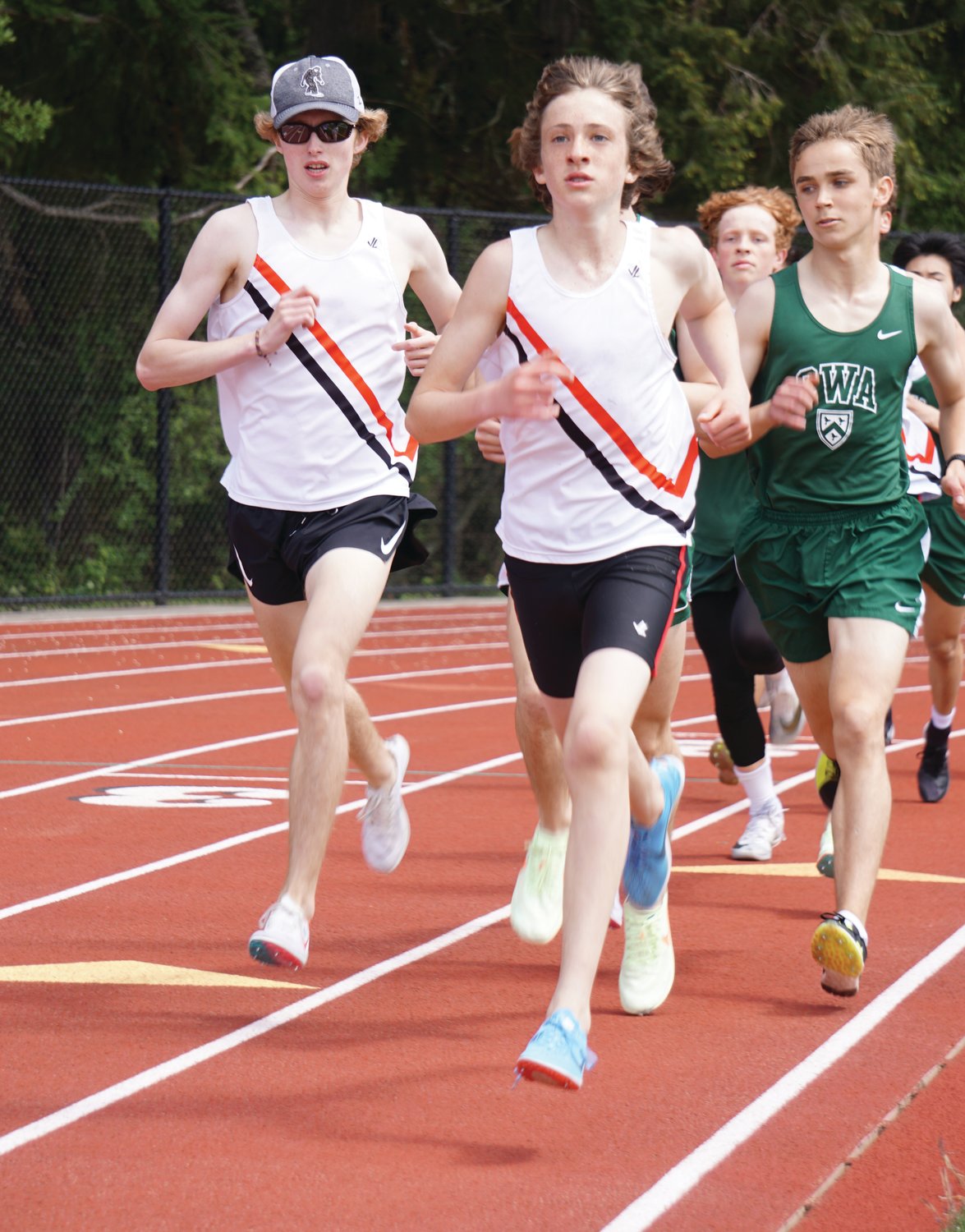 Max Allworth-Miles and Soare Johnston race ahead in the 1600-meter event.