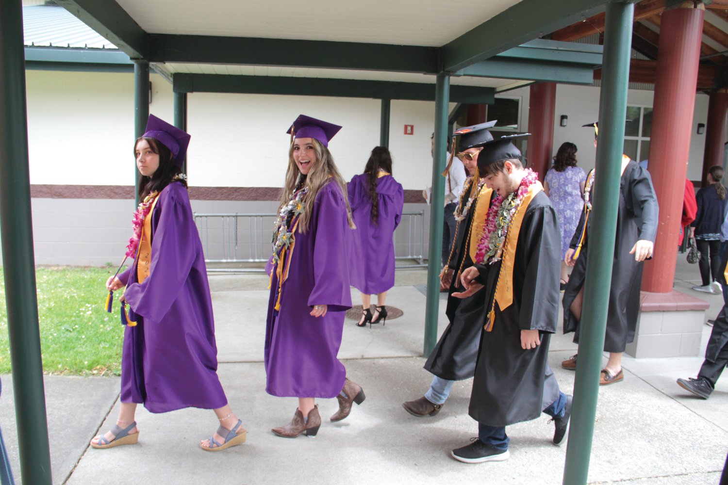 The graduating Rangers make their way to the gym for the processional at the start of the graduation ceremony for the Class of 2022 Saturday.