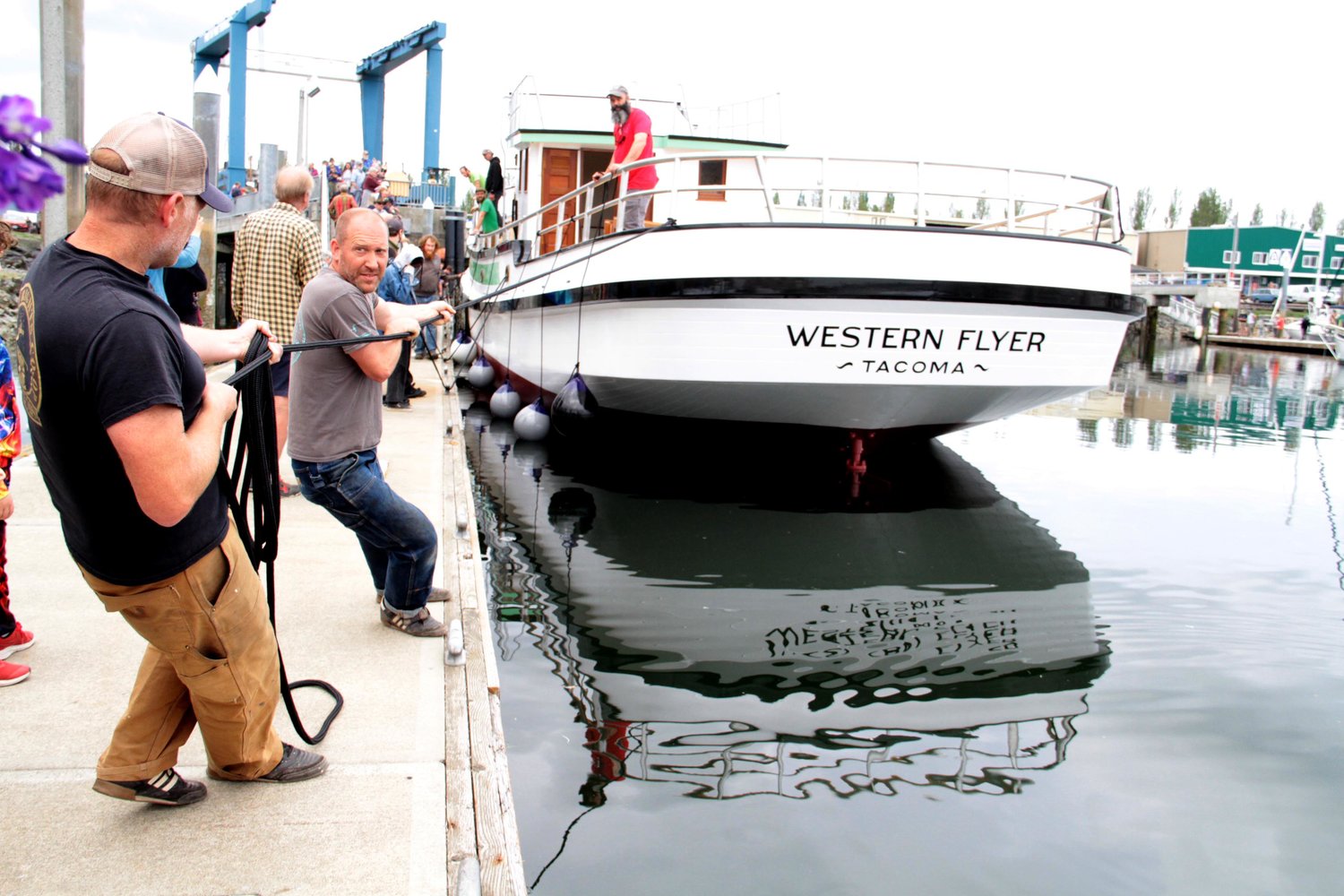 The Western Flyer is pulled to its temporary mooring spot before leaving Port Townsend under tug power.
