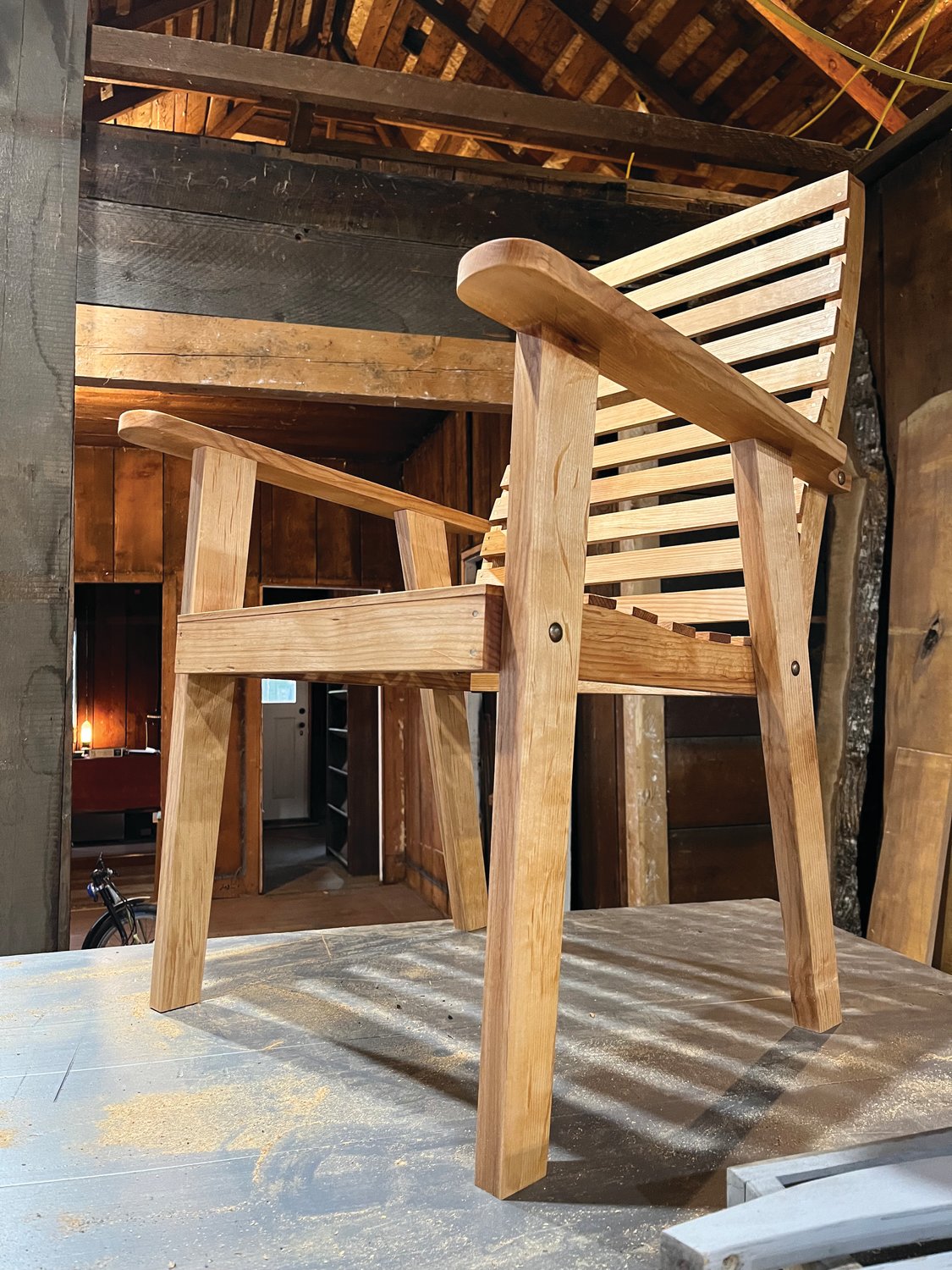 Local woodworker Paul Pearce will be displaying his lightweight porch chair — built with lumber from the red alder tree from Valley View Forest — in this year’s Woodworkers Show.