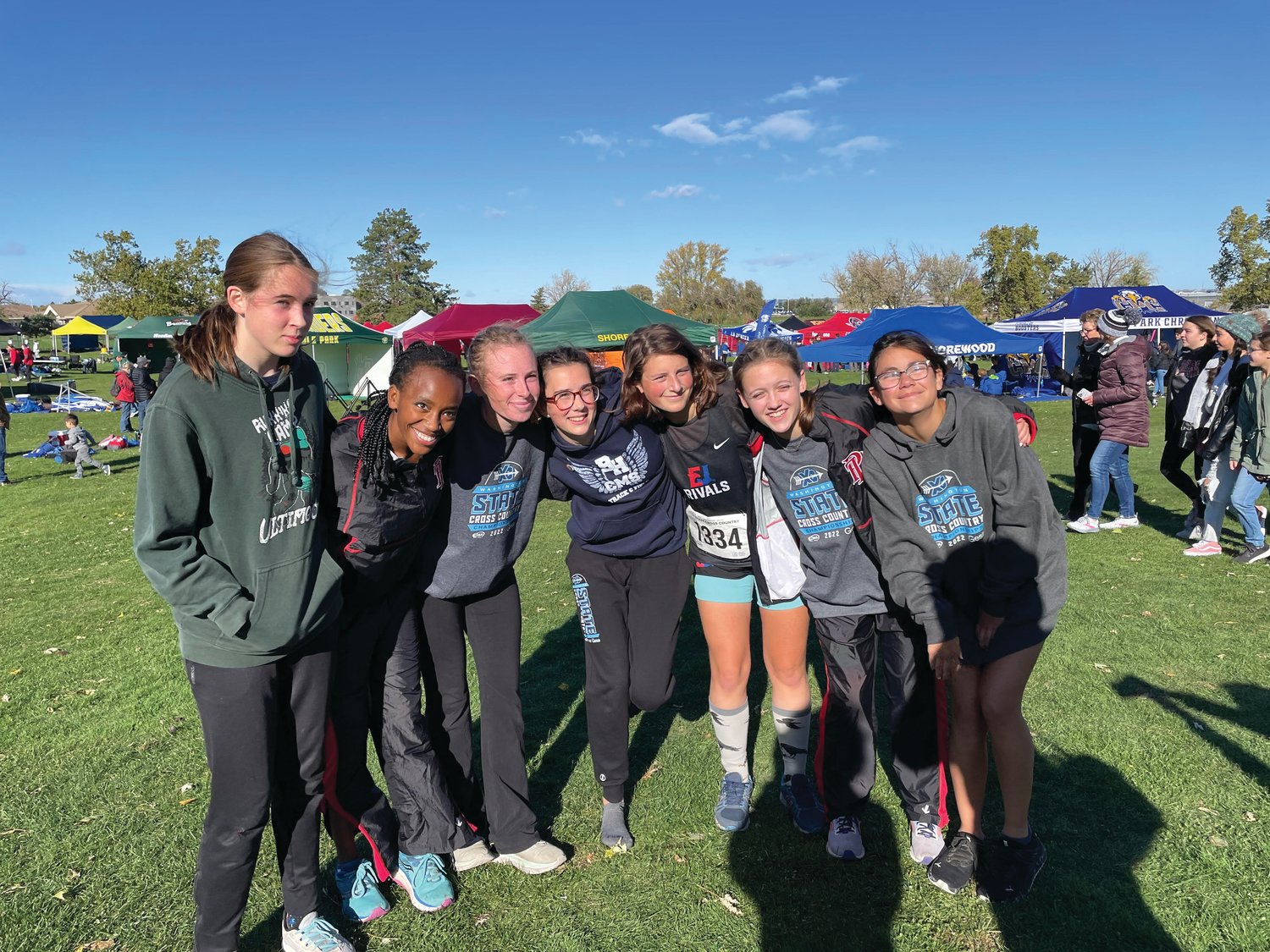The Rivals girls cross country team poses together after a stellar season.