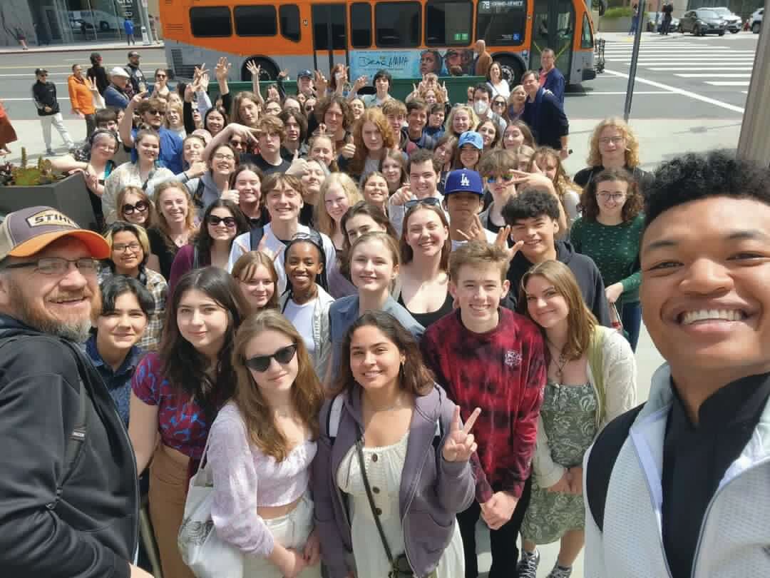 Young violin virtuoso Randall Goosby takes a selfie with Port Townsend students following his concert with the L.A. Philharmonic.