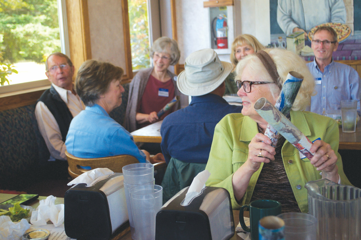 Eleanor Lee sings along with the group gathered at Ferino’s Pizza on June 27, 2019 for the one-year anniversary of the Memory Cafe. Leader file photo