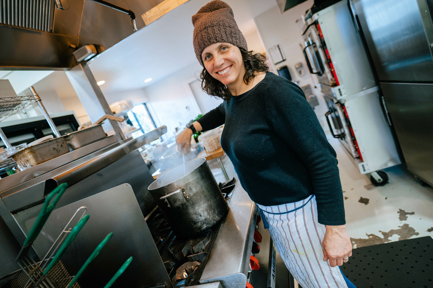 Aimee Dailey-Fallat cooks from dawn until dark every Monday at Lila’s Kithchen in Port Townsend, pareparing dishes for her Planted customers. Photo by Greta Schmidt